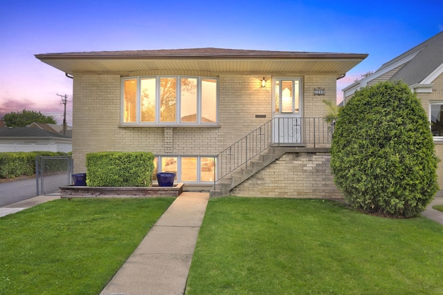 7260 W Fitch Ave, Chicago, IL 60631 - view of front of home featuring brick siding and a gate
