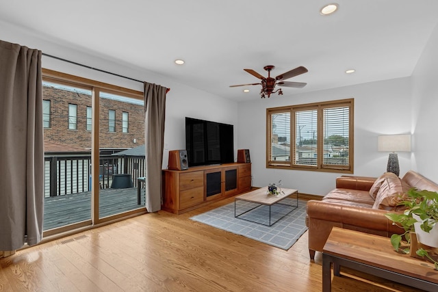 7260 W Fitch Ave, Chicago, IL 60631 - living room featuring wood finished floors, ceiling fan, and recessed lighting