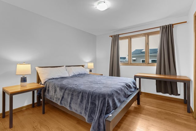 7260 W Fitch Ave, Chicago, IL 60631 - bedroom with light wood-style flooring and baseboards