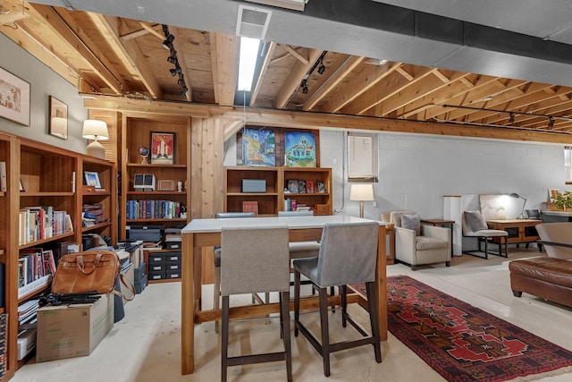 7260 W Fitch Ave, Chicago, IL 60631 - dining space with concrete flooring and concrete block wall