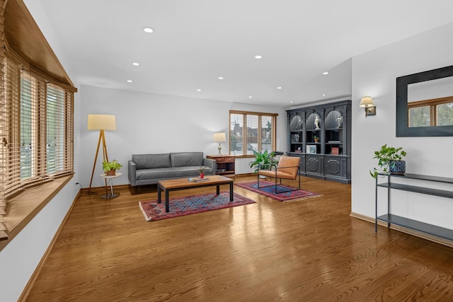 7260 W Fitch Ave, Chicago, IL 60631 - living room featuring wood finished floors, recessed lighting, baseboards, and built in features