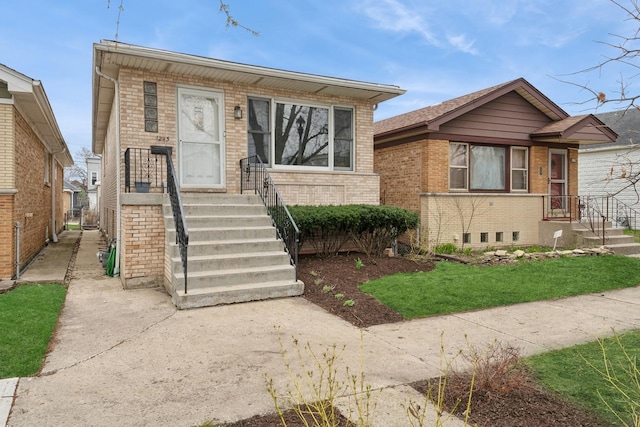 1235 Euclid Ave, Berwyn, IL 60402 - bungalow-style house featuring brick siding and a front yard