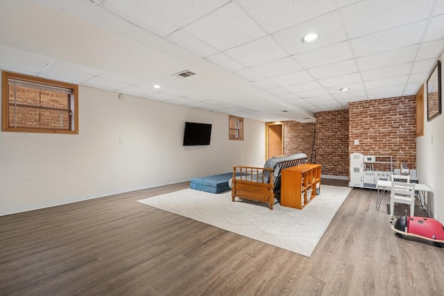 1235 Euclid Ave, Berwyn, IL 60402 - bedroom featuring wood finished floors, a drop ceiling, and baseboards