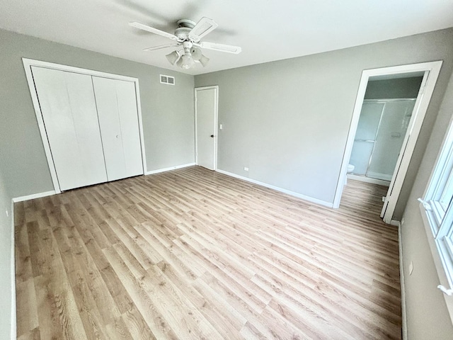 615 N Blanchard St, Wheaton, IL 60187 - unfurnished bedroom featuring wood finished floors, a closet, and baseboards