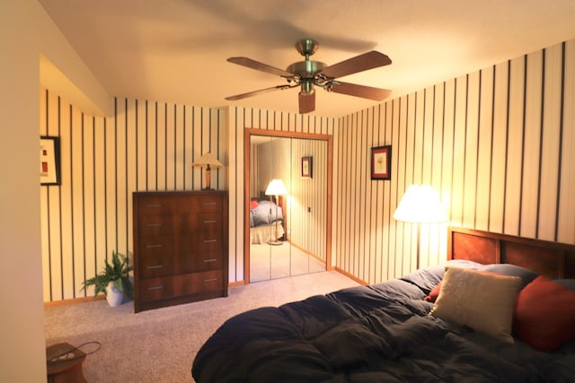 245 N Linn St, Princeton, IL 61356 - bedroom featuring carpet flooring, wallpapered walls, and a ceiling fan