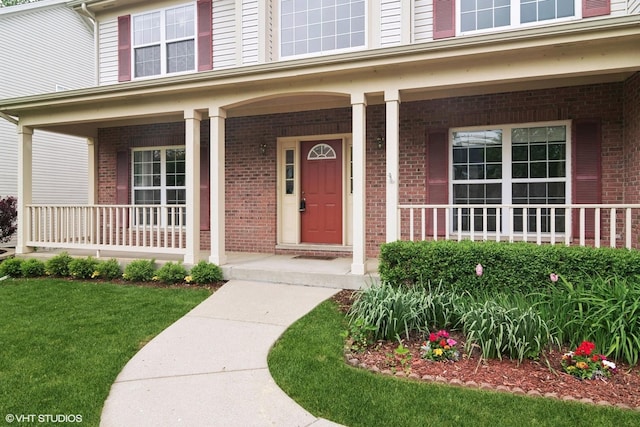 1048 N Palos Ave, Palatine, IL 60067 - doorway to property featuring a porch and brick siding
