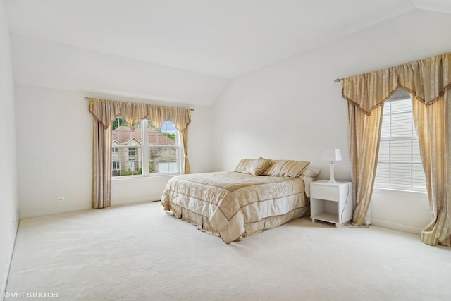 1048 N Palos Ave, Palatine, IL 60067 - carpeted bedroom featuring vaulted ceiling and baseboards