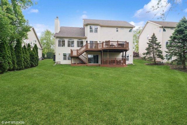 1048 N Palos Ave, Palatine, IL 60067 - rear view of house with a wooden deck, stairway, a chimney, and a lawn