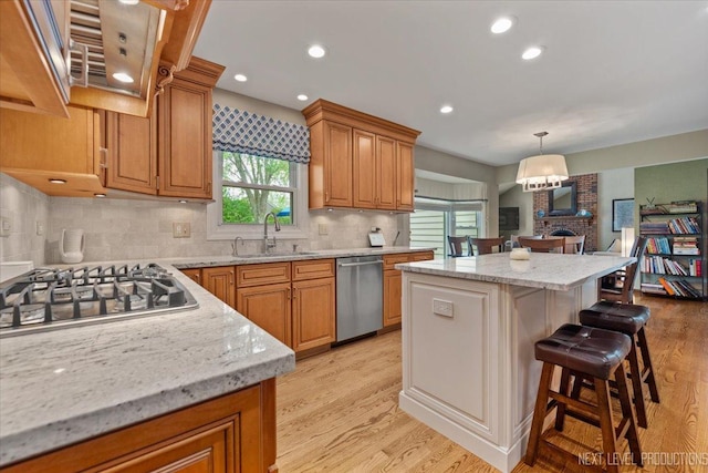 6446 Hanover Ct, Lisle, IL 60532 - kitchen featuring a sink, appliances with stainless steel finishes, a kitchen breakfast bar, light wood finished floors, and recessed lighting
