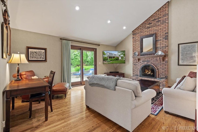 6446 Hanover Ct, Lisle, IL 60532 - living room with light wood-style floors, a fireplace, high vaulted ceiling, and recessed lighting