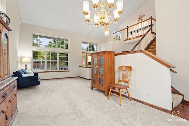 1748 Pinnacle Dr, Aurora, IL 60502 - living area with high vaulted ceiling, carpet, baseboards, a chandelier, and stairs