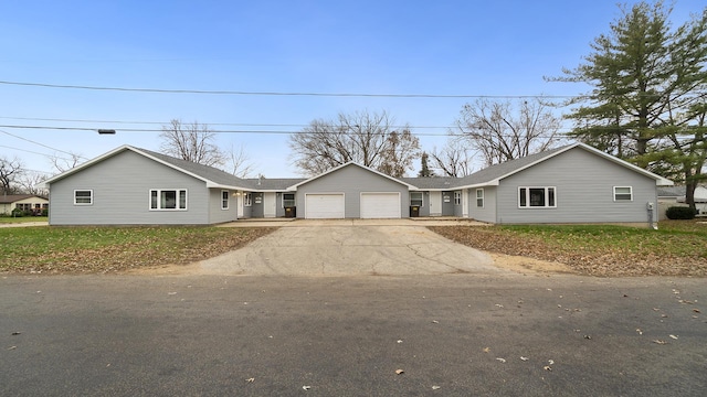 801 Adams St, Oregon, IL 61061 - ranch-style house featuring an attached garage and driveway