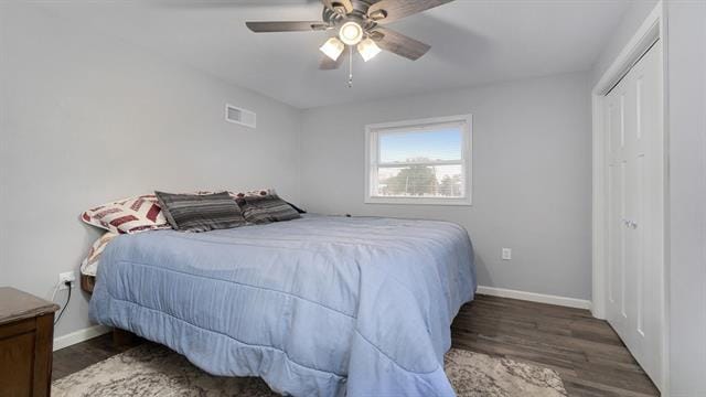 801 Adams St, Oregon, IL 61061 - bedroom with wood finished floors, baseboards, ceiling fan, and a closet