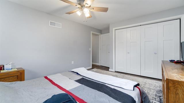 801 Adams St, Oregon, IL 61061 - bedroom with a closet and a ceiling fan