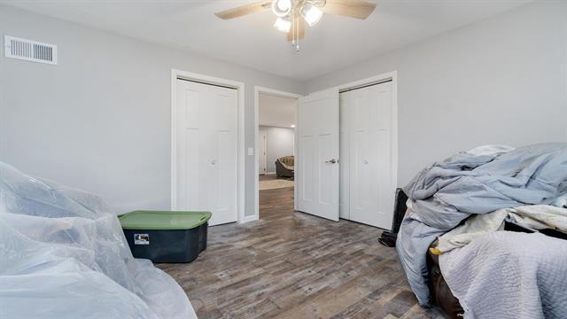 801 Adams St, Oregon, IL 61061 - bedroom featuring wood finished floors and a ceiling fan