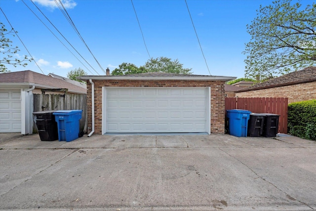detached garage with fence