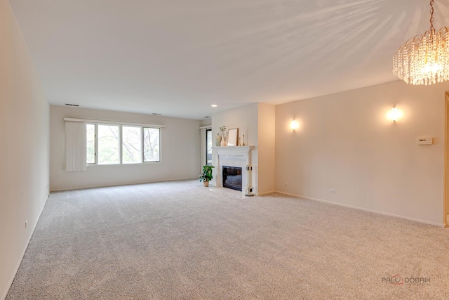 1088 Shermer Rd Unit 307, Northbrook, IL 60062 - unfurnished living room with a chandelier, carpet flooring, a fireplace with flush hearth, and baseboards