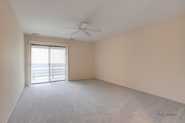 1088 Shermer Rd Unit 307, Northbrook, IL 60062 - empty room featuring carpet, a ceiling fan, and baseboards