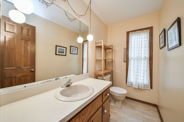 624 Joshua Ct, Naperville, IL 60540 - bathroom featuring toilet, baseboards, and vanity