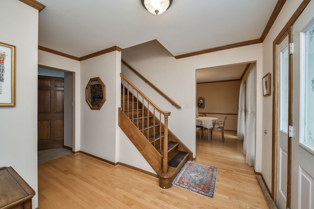 624 Joshua Ct, Naperville, IL 60540 - entryway featuring light wood-style floors, stairs, crown molding, and baseboards
