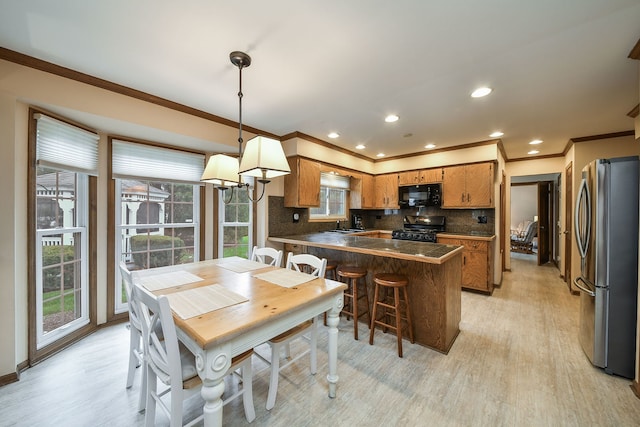 624 Joshua Ct, Naperville, IL 60540 - dining area with crown molding, healthy amount of natural light, recessed lighting, and light wood-style floors