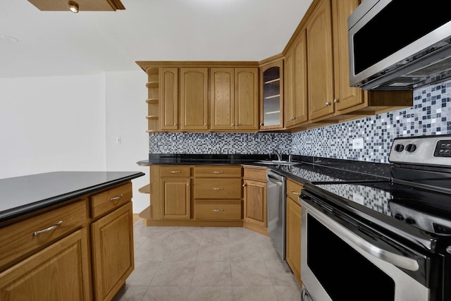 5455 N Sheridan Rd Unit 3611, Chicago, IL 60640 - kitchen with stainless steel appliances, dark countertops, decorative backsplash, and open shelves