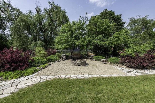 3030 Wall Ave, Waukegan, IL 60087 - view of patio / terrace featuring a fire pit