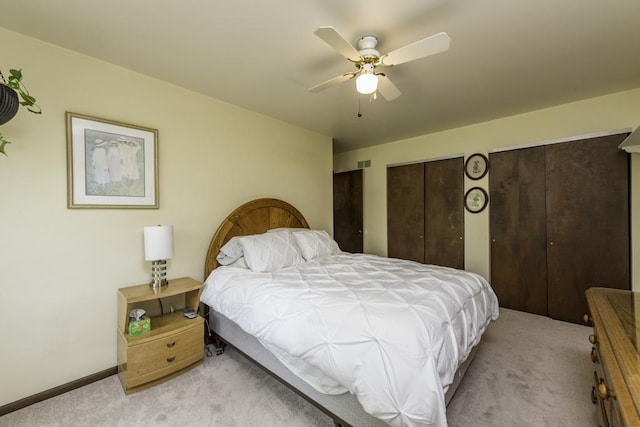 3030 Wall Ave, Waukegan, IL 60087 - carpeted bedroom with multiple closets and ceiling fan