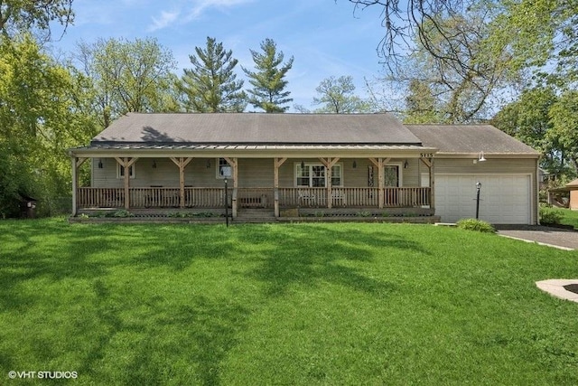 5115 Greenwood Pl, Mccullom Lake, IL 60050 - view of front of house with covered porch, a garage, a front lawn, and asphalt driveway