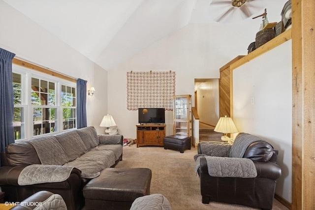 5115 Greenwood Pl, Mccullom Lake, IL 60050 - living area with carpet flooring, high vaulted ceiling, healthy amount of natural light, and ceiling fan