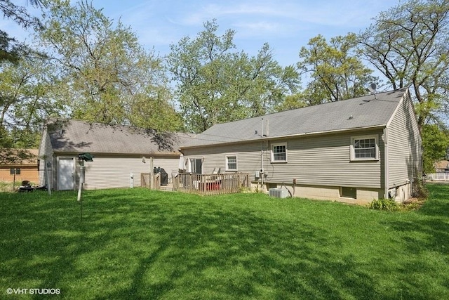 5115 Greenwood Pl, Mccullom Lake, IL 60050 - rear view of property with a lawn and a deck