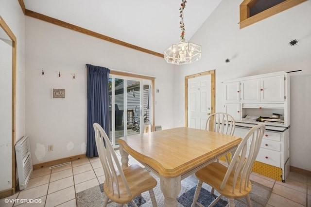 5115 Greenwood Pl, Mccullom Lake, IL 60050 - dining area featuring a chandelier, baseboards, light tile patterned flooring, and heating unit