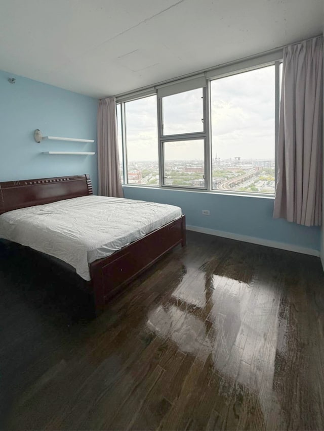1720 S Michigan Ave Unit 1711, Chicago, IL 60616 - bedroom featuring wood finished floors and baseboards