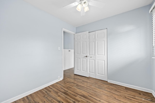 440 Berkshire Ave, Romeoville, IL 60446 - unfurnished bedroom with baseboards, wood finished floors, a closet, and ceiling fan
