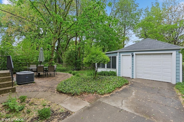 5530 Theobald Rd, Morton Grove, IL 60053 - view of yard featuring cooling unit and driveway