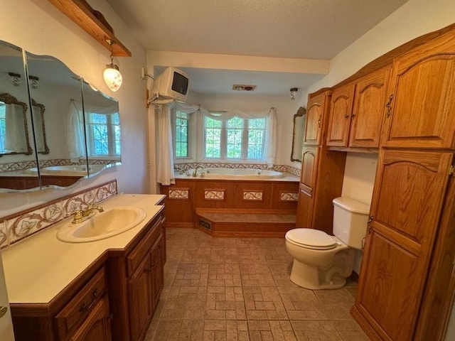 110 Martin Dr, Rock Falls, IL 61071 - bathroom featuring vanity and a garden tub