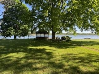 110 Martin Dr, Rock Falls, IL 61071 - view of green lawn featuring a gazebo and a water view