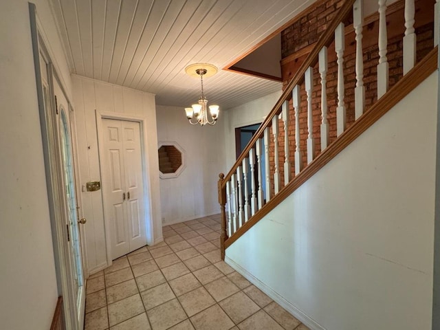 110 Martin Dr, Rock Falls, IL 61071 - entrance foyer featuring a chandelier, stairway, light tile patterned floors, and wooden ceiling