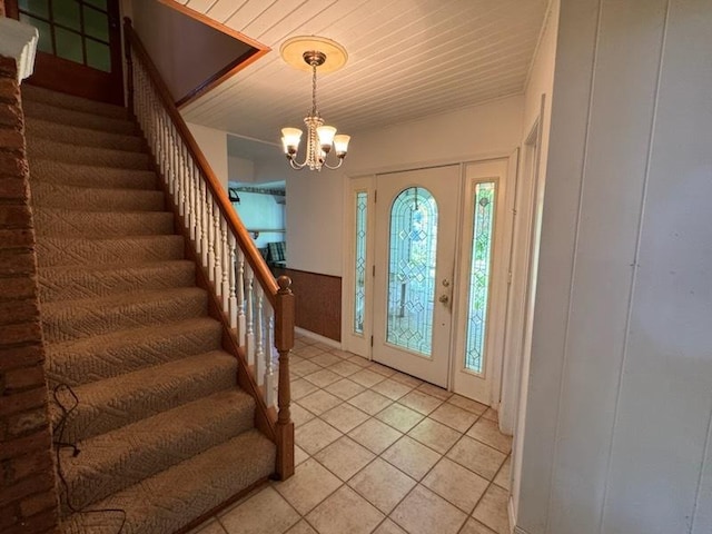 110 Martin Dr, Rock Falls, IL 61071 - foyer with stairway, a chandelier, light tile patterned floors, and wood ceiling