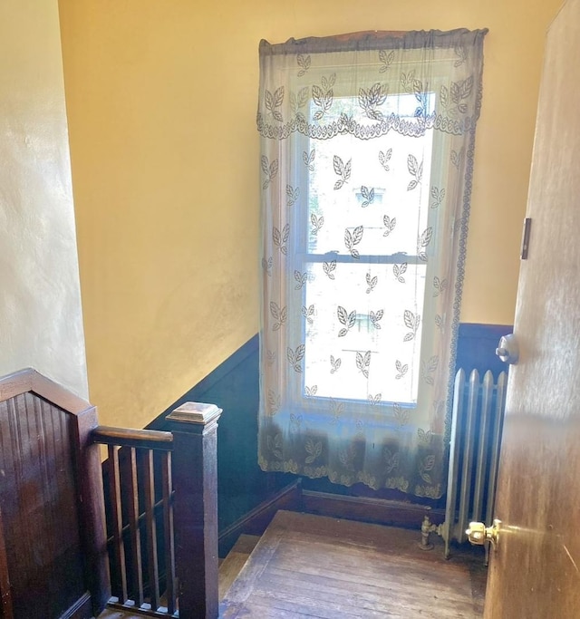 4943 W Monroe St, Chicago, IL 60644 - stairs featuring radiator heating unit
