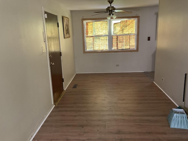 4640 185th Pl, Country Club Hills, IL 60478 - unfurnished room featuring a ceiling fan, wood finished floors, and baseboards