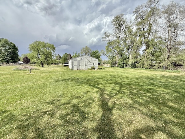 1010 Brentwood Rd, Machesney Park, IL 61115 - view of grassy yard with an outbuilding and a pole building