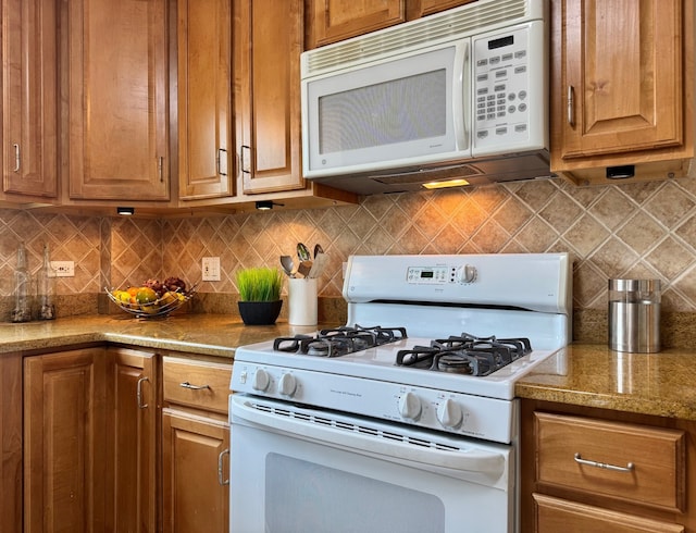 7727 W Palatine Ave, Chicago, IL 60631 - kitchen with white appliances, decorative backsplash, and brown cabinetry