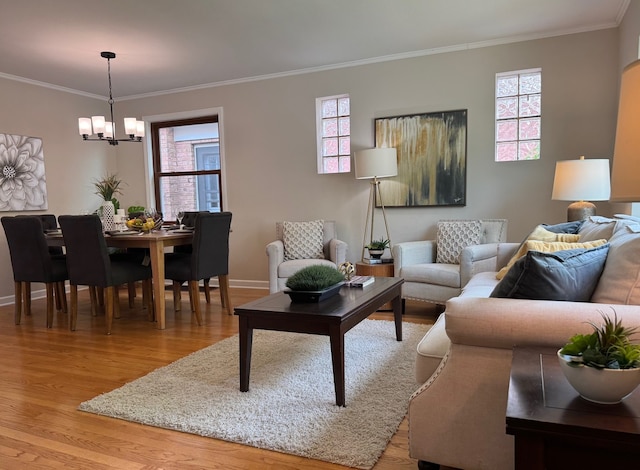 7727 W Palatine Ave, Chicago, IL 60631 - living area with light wood-style flooring, a chandelier, ornamental molding, and baseboards