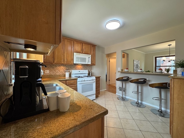 7727 W Palatine Ave, Chicago, IL 60631 - kitchen featuring white appliances, baseboards, backsplash, and brown cabinets
