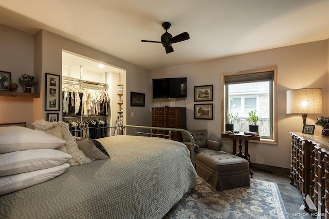 6928 Pershing Rd, Berwyn, IL 60402 - bedroom featuring dark wood finished floors, a spacious closet, baseboards, ceiling fan, and a closet
