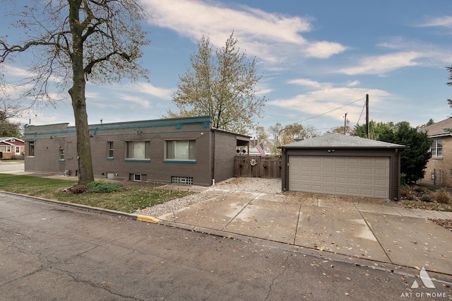 6928 Pershing Rd, Berwyn, IL 60402 - view of front of property with a garage and an outbuilding