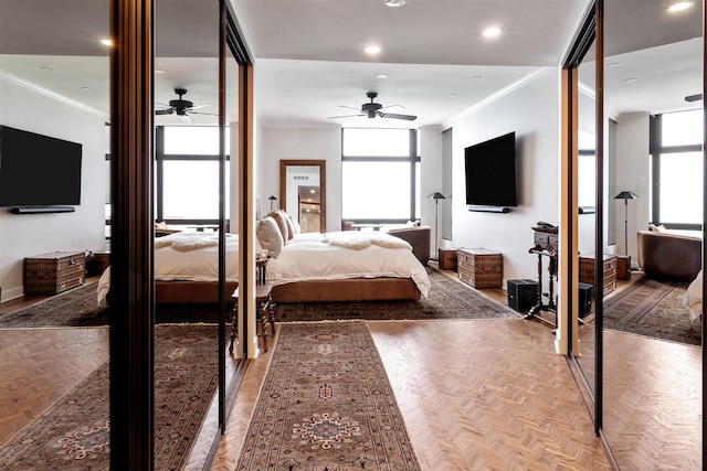 bedroom with crown molding, recessed lighting, and baseboards