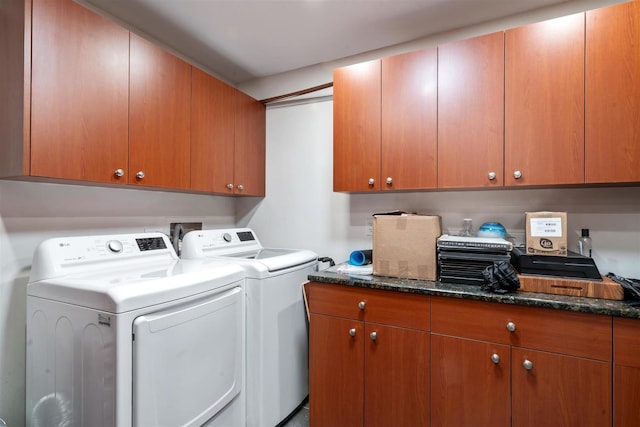 laundry area with cabinet space and washing machine and dryer