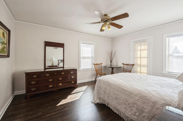 6504 N Artesian Ave, Chicago, IL 60645 - bedroom featuring baseboards, dark wood finished floors, and a ceiling fan